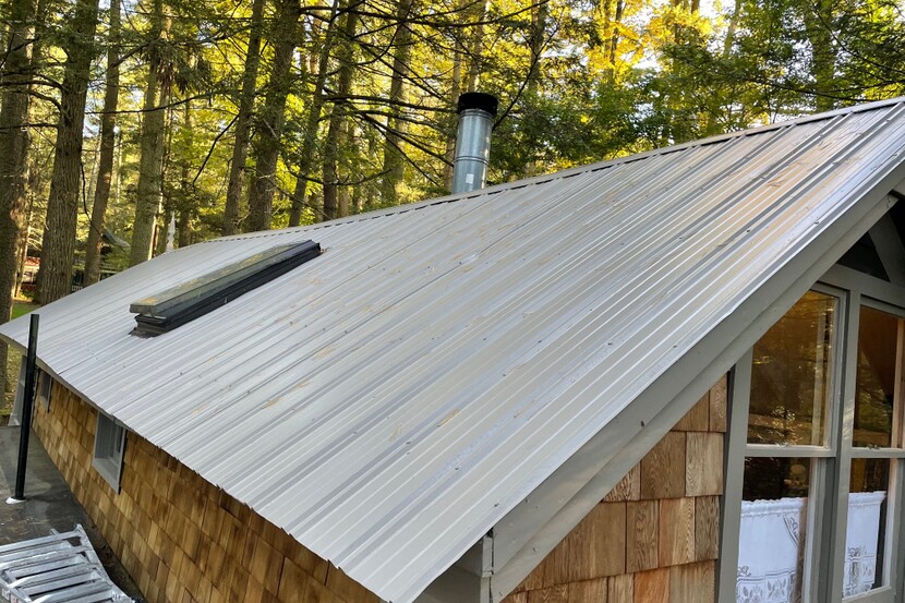 Pinegrove redone roofing by Bushnell Painting